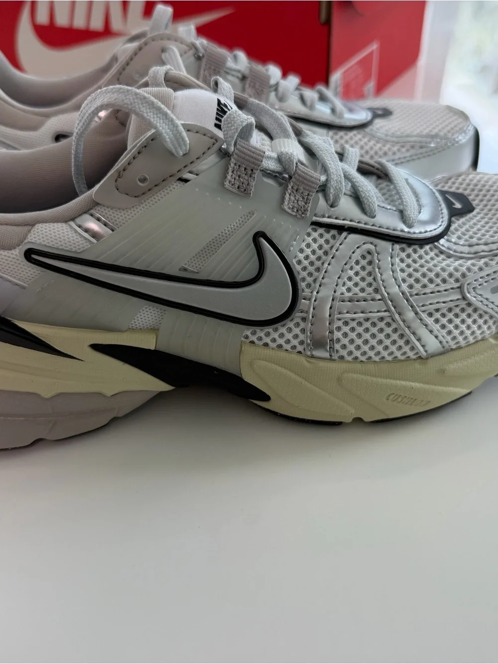 Women Nike V2K sneakers.